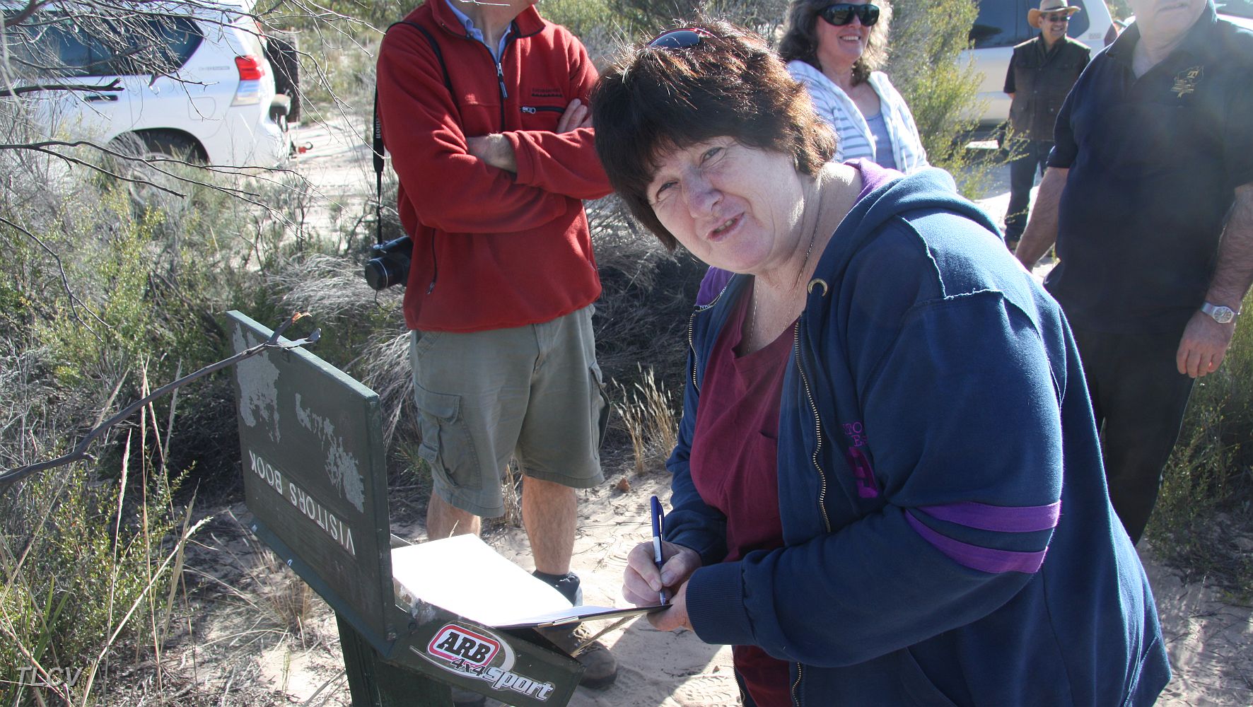 07-Carol signs the Visitors Book at Milmed Rock.JPG